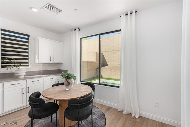 dining area featuring light hardwood / wood-style floors