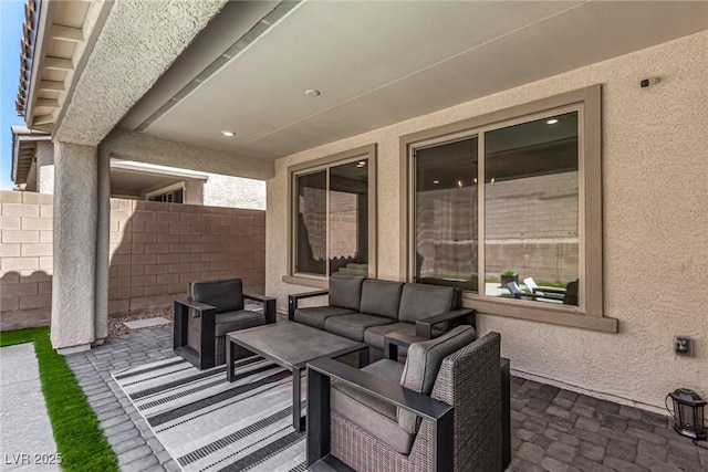 view of patio / terrace with an outdoor hangout area