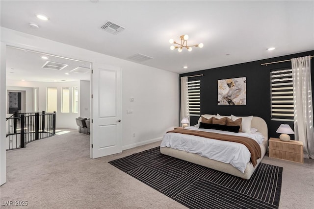 carpeted bedroom with a chandelier and multiple windows