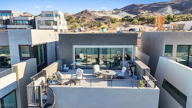 balcony featuring a mountain view