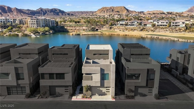 dock area with a water and mountain view