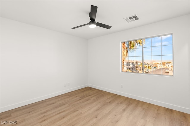 unfurnished room featuring ceiling fan and light hardwood / wood-style flooring