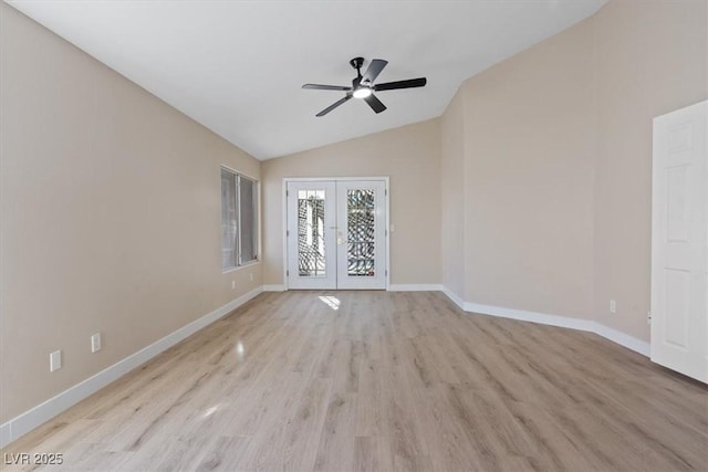 unfurnished room featuring french doors, light hardwood / wood-style floors, vaulted ceiling, and ceiling fan