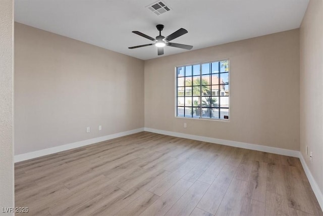 unfurnished room featuring light hardwood / wood-style floors and ceiling fan