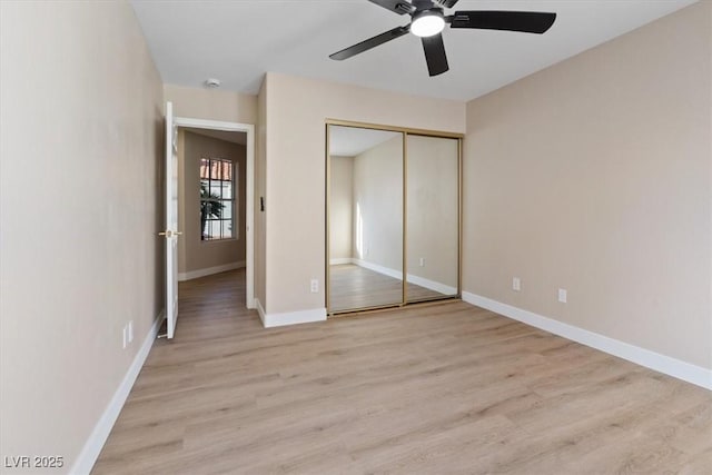 unfurnished bedroom featuring a closet, ceiling fan, and light hardwood / wood-style floors