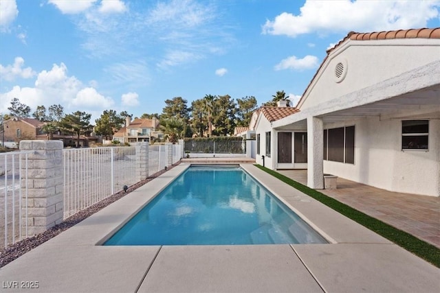 view of swimming pool featuring a patio