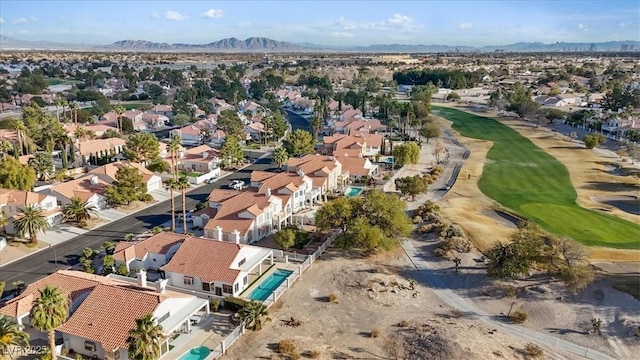 birds eye view of property featuring a mountain view