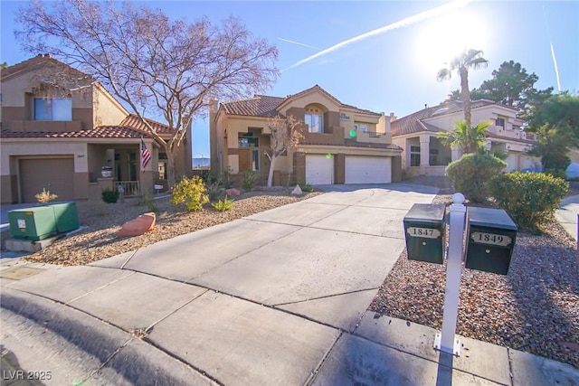 mediterranean / spanish-style home featuring a garage