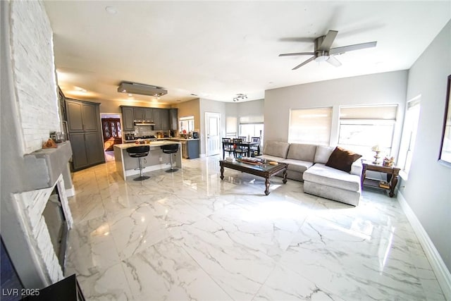 living room featuring ceiling fan