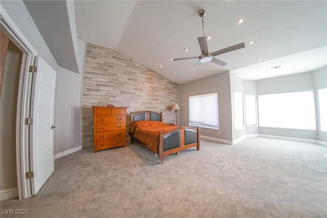 carpeted bedroom with multiple windows, vaulted ceiling, and ceiling fan