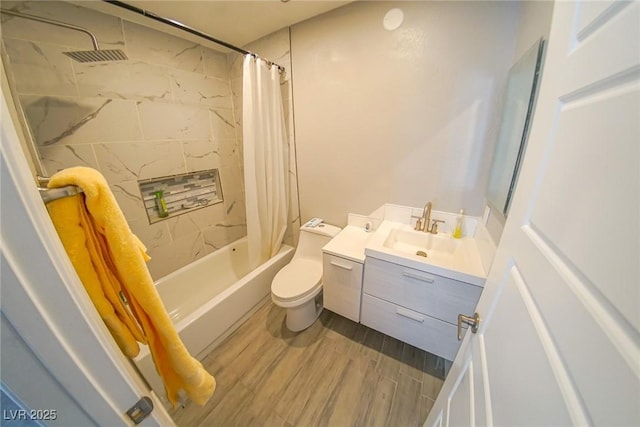 full bathroom with vanity, toilet, hardwood / wood-style floors, and shower / bath combo with shower curtain