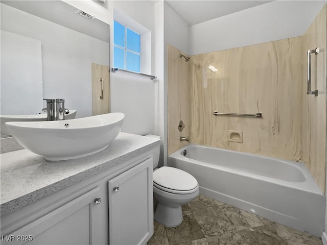 full bathroom featuring shower / bathing tub combination, vanity, and toilet