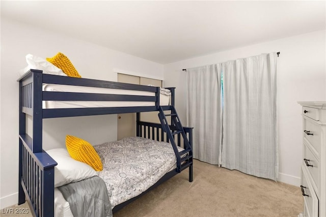 bedroom with light colored carpet