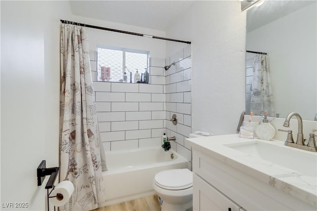 full bathroom featuring shower / bath combo, vanity, toilet, and wood-type flooring