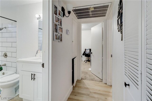 hall featuring light hardwood / wood-style flooring