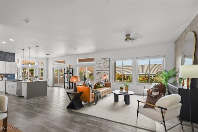 10300 Bent Brook Pl, Las Vegas, NV 89134 - living area featuring a ceiling fan, recessed lighting, a wealth of natural light, and wood finished floors