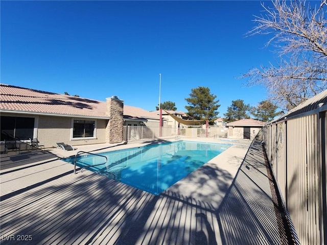 view of swimming pool with a patio