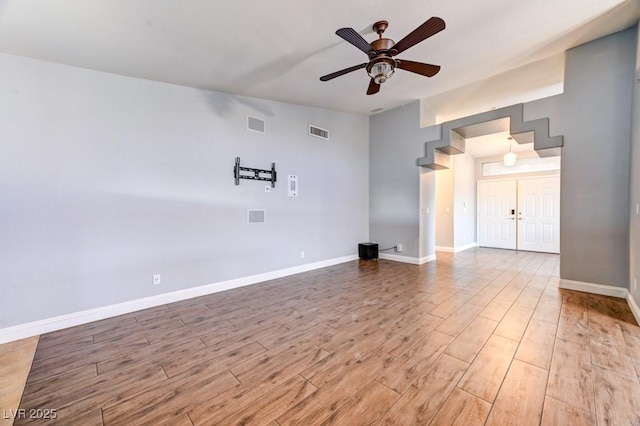 unfurnished room featuring ceiling fan