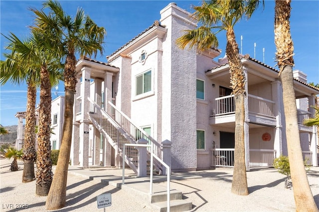 view of property with stairs