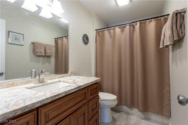 full bath featuring toilet and vanity