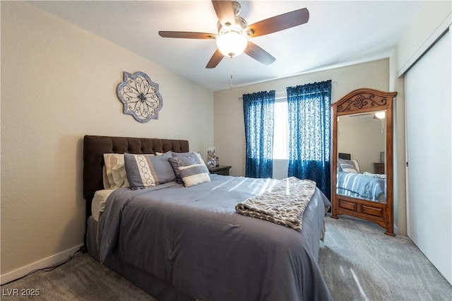 carpeted bedroom featuring a ceiling fan