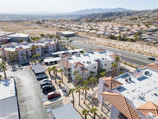 drone / aerial view with a residential view and a mountain view