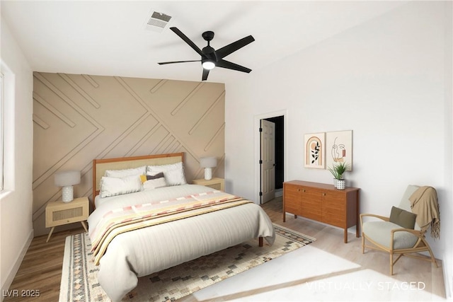 bedroom with wood-type flooring and ceiling fan