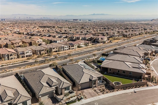 drone / aerial view featuring a mountain view