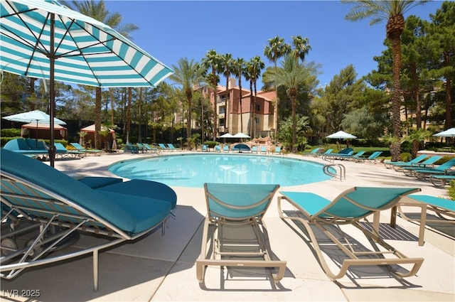 community pool with a patio