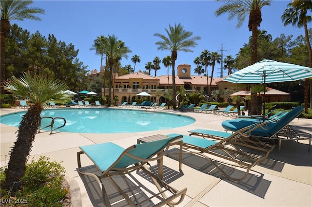 pool with a patio area