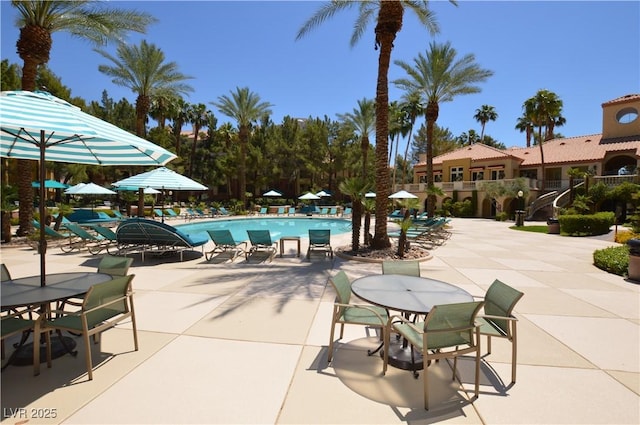 pool with a patio