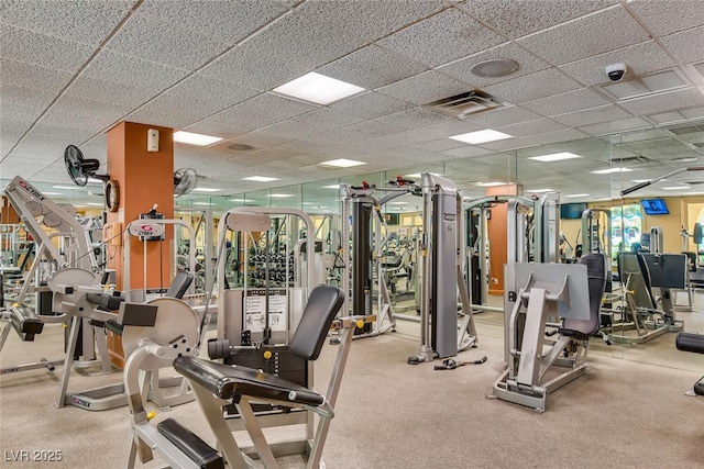 gym with visible vents and a drop ceiling