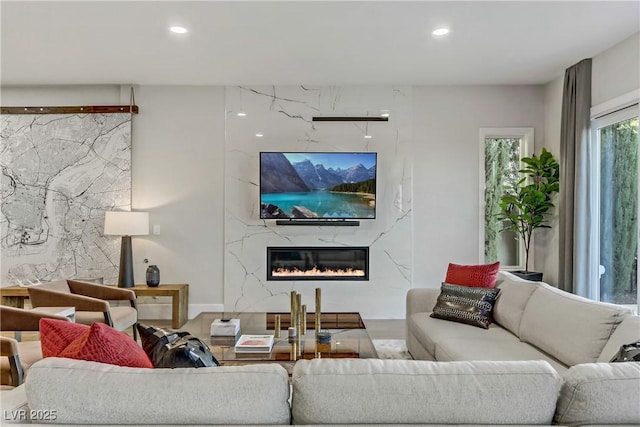 living room featuring a fireplace