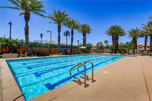 view of swimming pool featuring a patio