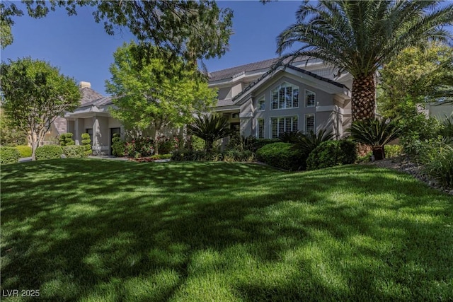 exterior space featuring a front lawn