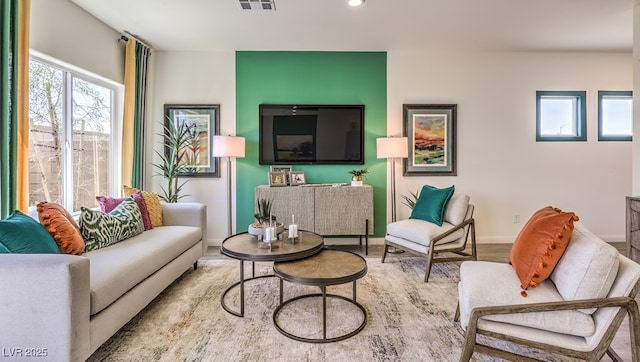 living room with light hardwood / wood-style floors