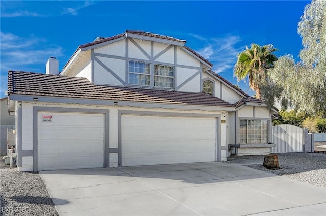 tudor home with a garage