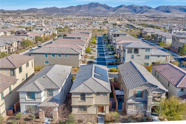 drone / aerial view featuring a mountain view