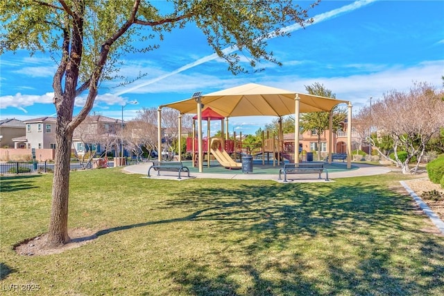 view of playground with a yard