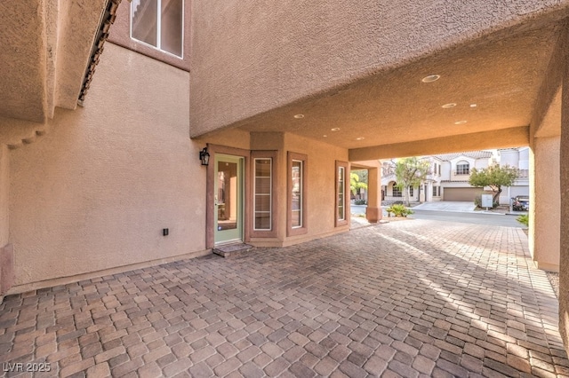 view of patio with a garage