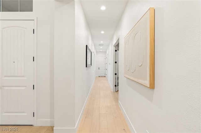 corridor featuring light hardwood / wood-style flooring