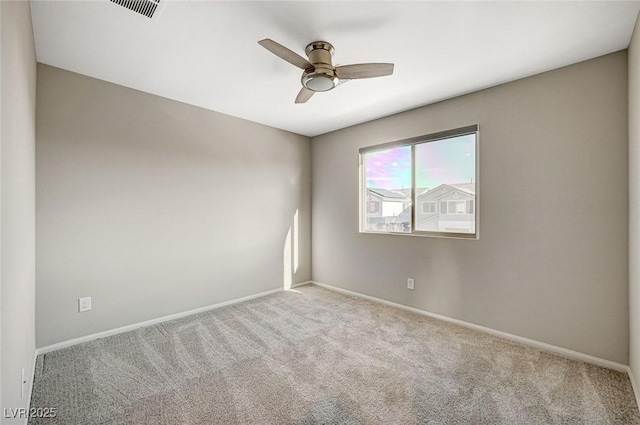 unfurnished room with light carpet and ceiling fan