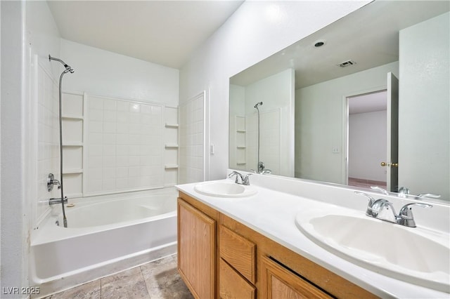 bathroom with tile patterned flooring, vanity, and tub / shower combination