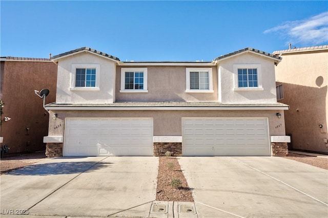 view of front of property featuring a garage