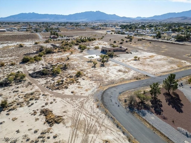 bird's eye view with a mountain view