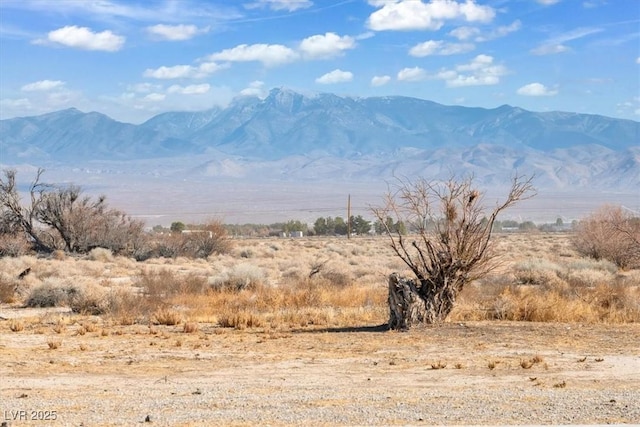 view of mountain feature with a rural view