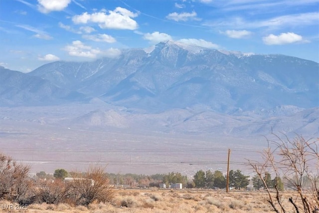 mountain view featuring a rural view