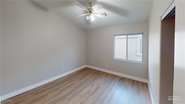 spare room with ceiling fan and light hardwood / wood-style flooring