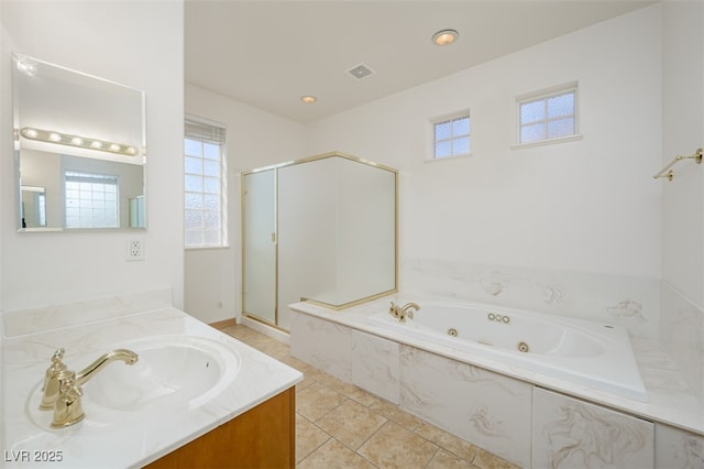 full bathroom featuring tile patterned flooring, vanity, visible vents, a tub with jets, and a stall shower