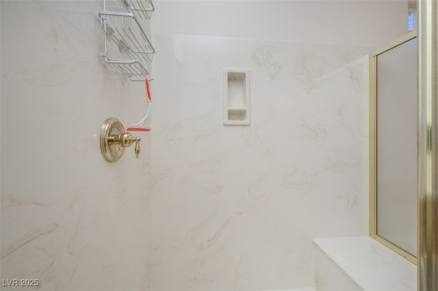 full bath featuring a marble finish shower